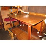 Suite of mid 20th Century teak dining room furniture comprising: a small draw-leaf table, set of six