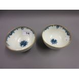 Pair of 18th Century First Period Worcester tea bowls decorated externally in floral relief and