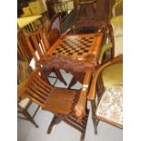 Reproduction walnut chess table with matching hamlet style crossover chairs