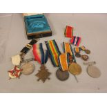 Africa Service medal, a '39 / '45 medal, three World War I medals, all to the Saunders family,