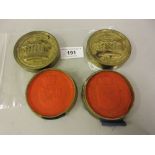 Two 19th Century circular gilt metal seal cases