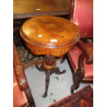 Victorian walnut and marquetry inlaid trumpet form work table, the hinged circular lid enclosing a