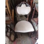 Set of six French beechwood dining chairs, the floral carved backs with centre pads above