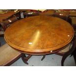 Victorian mahogany circular centre table with a segmented moulded tilt top above an octagonal