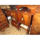 George IV mahogany and black line inlaid breakfront sideboard with a centre door flanked by a door