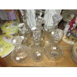 Eight various glass decanters with stoppers with six silver plated decanter labels