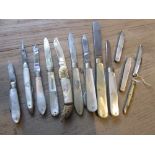 Collection of thirteen various folding fruit knives with steel blades