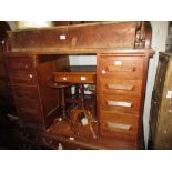 20th Century oak roll top pedestal desk with wooden handles