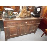 Small 18th Century oak dresser base with typical arrangement of drawers and cupboard doors