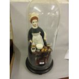 20th Century spice doll standing before a small spice cabinet under a large glass dome