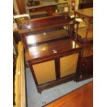 Small Regency rosewood chiffonier, the mirrored shelf back on turned supports above two grilled