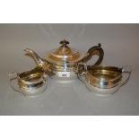 London silver three piece tea service of oval baluster form