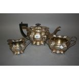 Early 20th Century Birmingham silver three piece tea service of oval lobed design