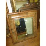 Late 17th / early 18th Century walnut cushion framed wall mirror (bleached), 22ins x 20ins Veneer is