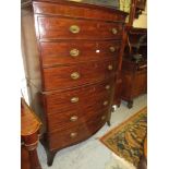 19th Century mahogany bow fronted chest on chest, the moulded cornice above three long drawers