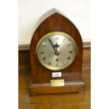 Early 20th Century mahogany lancet shaped mantel clock, the silvered dial with Roman numerals,