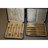 Cased set of six Sheffield silver cake forks together with a cased set of six silver handled tea