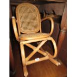 Child's bamboo rocking chair, together with a child's wicker armchair