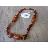 Faceted bead and amber necklace