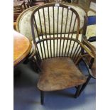 George III oak and elm stick back Windsor armchair with a shaped panel seat raised on turned