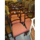 Set of eight Victorian mahogany dining chairs with moulded rail backs, overstuffed seats and