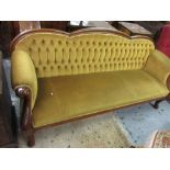 Victorian gold button upholstered triple arched back sofa on cabriole front supports