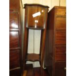 Edwardian inlaid jardiniere stand (at fault) together with a mahogany circular occasional table on a