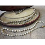 19th Century single row graduated cultured pearl necklace together with a simulated pearl and