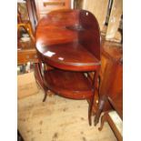 Regency mahogany and black line inlaid corner washstand on splay supports