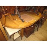 Modern French light oak circular extending dining table with two extra leaves together with a set of