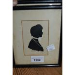 W.A. Bettesworth, group of three silhouette profile portraits of lady, gentleman and a boy, ebonised