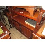 19th Century mahogany buffet having carved galleried top with undertier and two panelled doors on