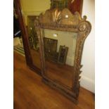 George II carved and gilded wall mirror with a shell frieze and a bevelled glass plate (original