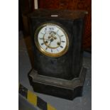 Large 19th Century French black slate mantel clock, the circular white enamel dial with Roman