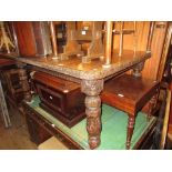 Small Victorian carved oak wind-out extending dining table with single extra leaf