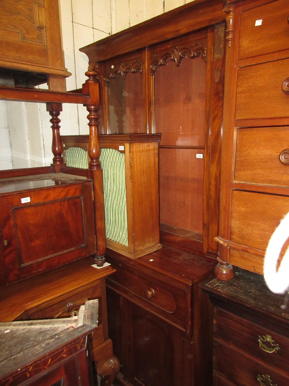 Victorian mahogany secretaire bookcase, the moulded cornice above two glazed doors, the base with