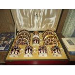 Set of six Royal Crown Derby Imari pattern coffee cans with saucers in a fitted case, labelled