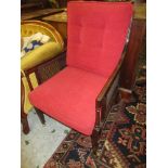 Late 19th Century mahogany bergere armchair on square tapering front supports