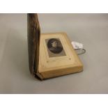 Small Victorian leather bound photograph album containing a collection of various portrait