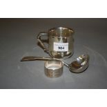 Sheffield silver Christening mug, a silver napkin ring and a 19th Century silver ladle