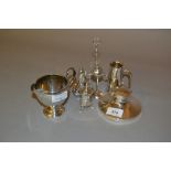 Silver capstan inkwell, sterling silver jug, silver tot measure, two silver condiments and a