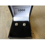 Pair of 18ct white gold diamond ear studs, approximately 1.05cts total