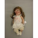 Alt Beck & Gottschalck, German bisque headed doll with sleeping eyes, open mouth and two teeth,