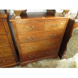 Early 20th Century mahogany chest having two short and three long drawers with brass handles and