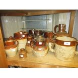Quantity of salt glazed stoneware mugs and jugs Loving Cup on right side of picture - good condition