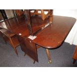 Reproduction mahogany twin pillar D-end dining table with single extra leaf raised on turned