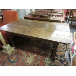 Early 19th Century French rectangular oak farmhouse table, the plank top above two frieze drawers