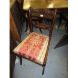 Set of six Regency mahogany brass inlaid rail back dining chairs with drop-in seats on sabre front
