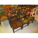 Set of eight (six plus two) early 19th Century mahogany rail and turned bobbin back dining chairs