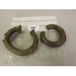Two bronze slave bangles / currency